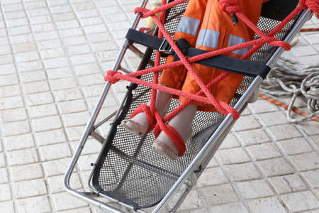 first aid ,emergency cradle with dollの写真素材