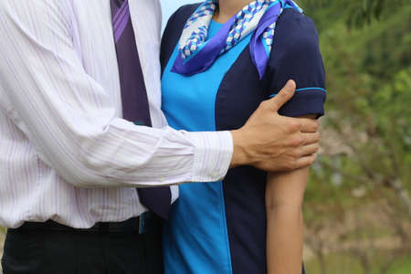 man hand hug womenの写真素材