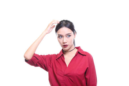 Charming beautiful face woman with perfect skin portrait present beauty skincare spa and cosmetics concept, beautiful model girl hand hold shiny brown straight hair. care and hair products.の写真素材