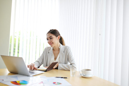 Smart young businesswoman crew working with new startup project in modern loft office. Generic...