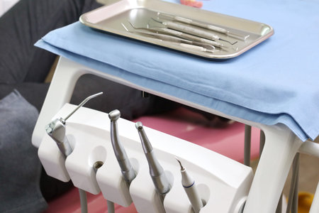 dentist tool for patient open mouth during oral checkup with mirror near by, Trust in medicine treatment with professional doctor for good healthcare in clinic office roomの写真素材