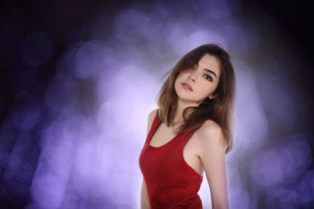 Group of dancing young people enjoying nightclub, People in night club. Dancing, drinking and having fun. blue purple light conceptの写真素材