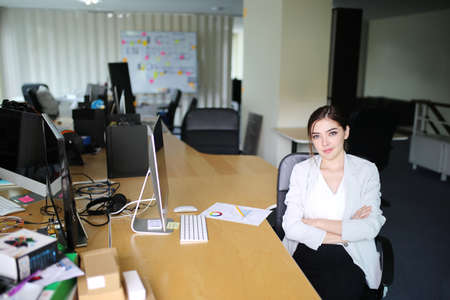 Smart young businesswoman crew working with new startup project in modern loft office. Generic design notebook education and inspiration lifestyle. Europe and European people.の写真素材