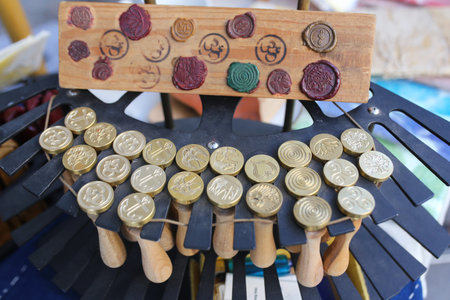 many gold wax stamper on letter envelop conceptの写真素材