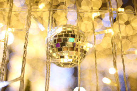 mirror disco ball hang on ceiling entrance tunnel with many small party light background, entertainment and enjoy night life star concert conceptの写真素材