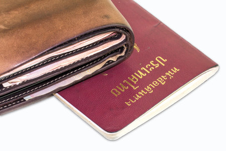 Closeup wallet and passport on a white backgroundの写真素材
