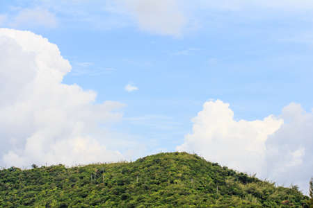 White clouds against a blue skyの写真素材