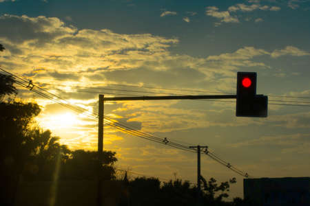 Blue sky in sunset . The traffic light poleの写真素材