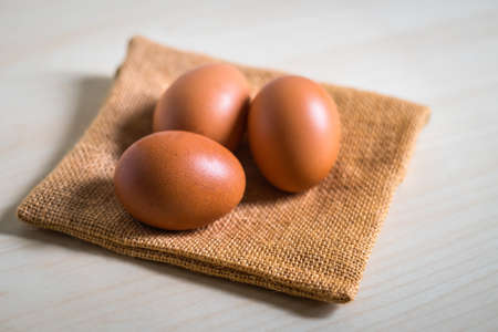 Close up of eggs on a Sackの写真素材