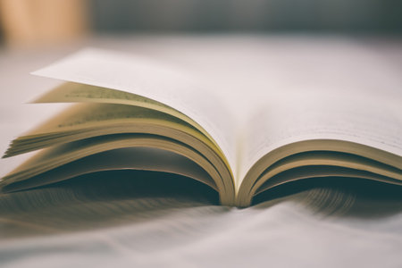 Old book opened on the bed with vintage toneの写真素材