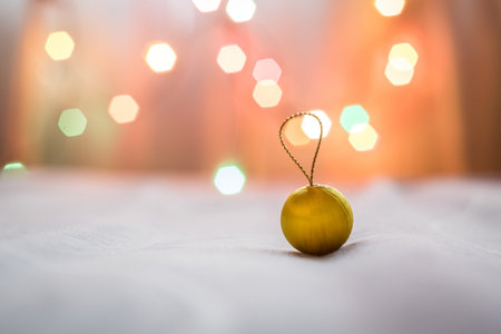 Christmas ball on a bed