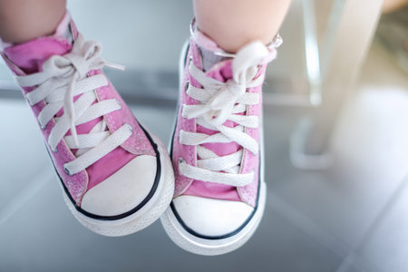 Sneakers on a kid feet