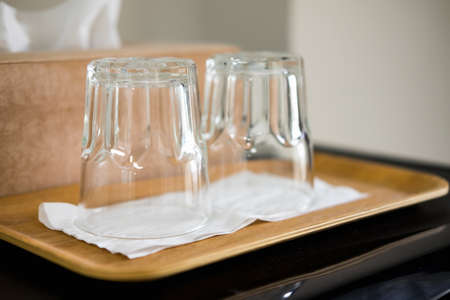 Close up a Glass of water on Wooden trayの写真素材