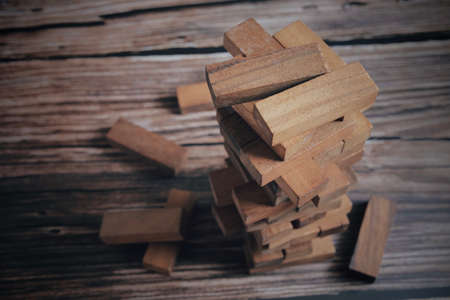 Wood block tower game on wood tebleの写真素材