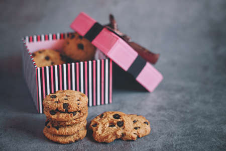 Chocolate cookies in a gift box on a loft backgroundの写真素材