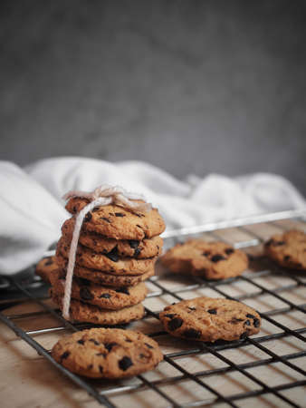 Baked chocolate cookies cooling on a rackの写真素材