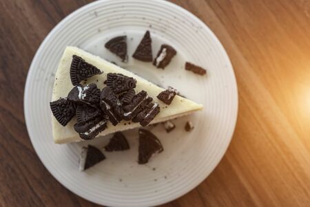 Cheesecake with chocolate cookies and cream biscuitsの写真素材
