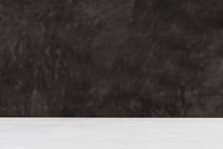 white wood table and  raw cement background. の写真素材