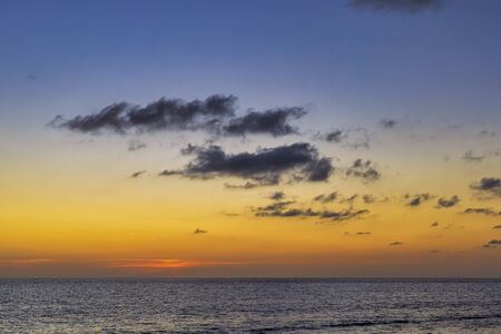 Sky with cloud yellow and blue color background. With copy space for text or design.の写真素材