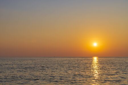 Sky with sunset cloud yellow and blue color background. With copy space for text or design.の写真素材
