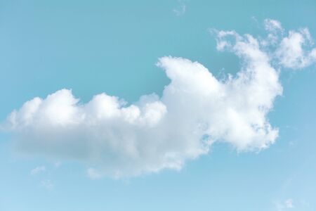 Soft blue sky with cloud background. With copy space for text or design.の写真素材