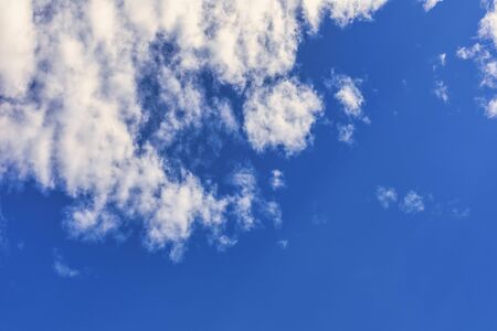 Blue sky with cloud background. With copy space for text or design.の写真素材