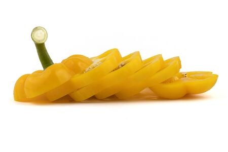Slide fresh yellow bell pepper. Sweet pepper. Giant pepper. Isolate on white background. .の写真素材