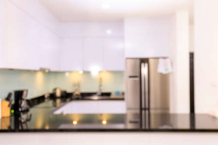 Blur kitchen interior and desk table top space home background.の写真素材