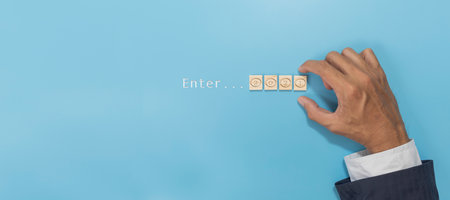 Top view Enter new year 2021 with business man hand putting wood cube. Creative background for the new year. With copy spaceの写真素材