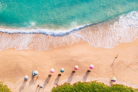 Aerial drone top view crowd of happy people relax at tropical Beach with sunset in Phuket, Thailand, Beautiful Phuket beach is famous tourist destination at Andaman sea. Holiday summer conceptの写真素材