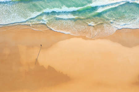 Aerial drone top view crowd of happy people relax at tropical Beach with sunset in Phuket, Thailand, Beautiful Phuket beach is famous tourist destination at Andaman sea. Holiday summer conceptの写真素材