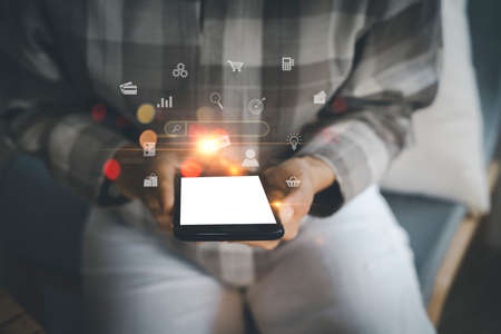 Women using mobile phone. Close up women hand use smart phone connect to internet for application technology digital marketing Financial and banking shopping. Digital link tech, big data.の写真素材