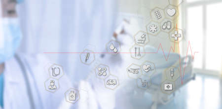 Medicine doctor with stethoscope in hand hold syringe icon medical network connection on virtual screen interface. Modern medical technology and innovation concept. Medical and health conceptの写真素材