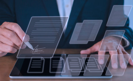 businessman use electronic pen sign signature on electronic  E-signing, data sheet document...