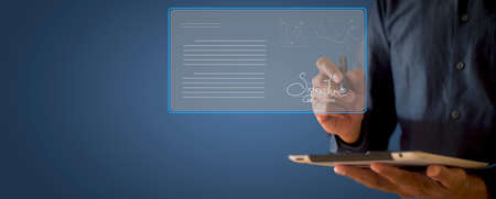 businessman use electronic pen sign signature on electronic  E-signing, data sheet document management, paperless office concept. Businessman using stylus pen signing e document on digital tablet.の写真素材