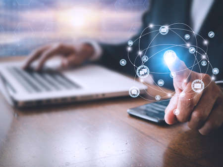 Businessman hand using fingerprint identification to access personal financial data, Fingerprint scan provides security access with biometrics identification. Business technology concept. With copy space bannerの写真素材