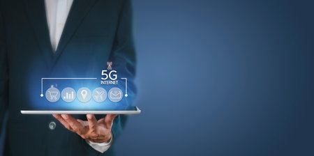 Business network communication concept. 5G Network Internet Mobile Wireless. 5g internet connects all activities in your hands shopping, finance, travel, location, contact, etc with copy space bannerの写真素材