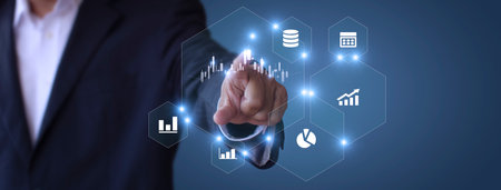 Businessman show stock market bar chart grow up to target. Business finance concept. Businessman's hands Show success graph, stocks grow every year  With copy space bannerの写真素材