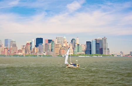Sail yacht in foreground of Manhattanの写真素材