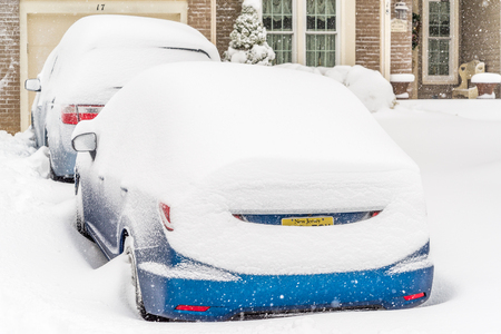 Car covered with snow after heavy snow stormの写真素材