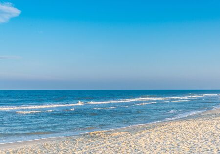 Stock photo of ocean surf at sandy beachの写真素材