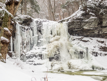 Frozen waterfall in Ricketts Glen State Park, Pennsylvaniaの写真素材
