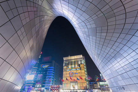 SEOUL, SOUTH KOREA - MARCH 29,2015: Dongdaemun Design Plaza at Night, New development in Seoul, designed by Zaha Hadid. Photo taken March 29, 2015 in Seoul, South Korea.のeditorial素材