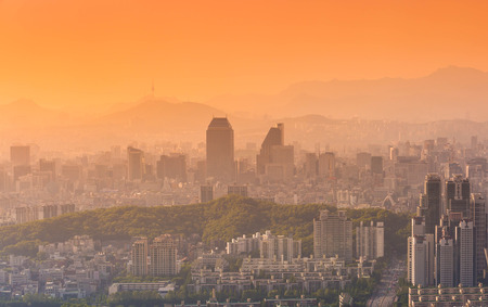 Seoul city and Downtown skyline in Sunset in Misty day South Korea.の写真素材