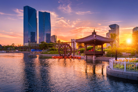 Traditional and modern architecture of seoul city in sunset, central park in songdo International business district, Incheon South Korea.の写真素材