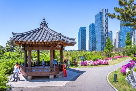 Incheon, South Korea - May 05, 2015: People are riding a tourist boat in summer of Korea at Central Park in Songdo District, Incheon South Korea.のeditorial素材