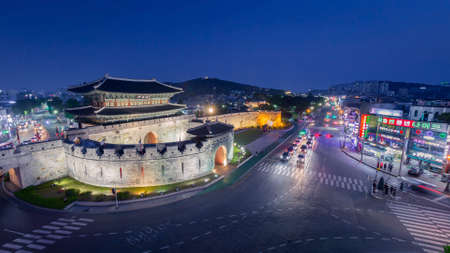Suwon, South Korea - November 12, 2019:  Janganmun gate And traffic in night at Hwaseong Fortress, Suwon, South Korea.のeditorial素材