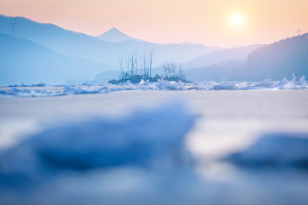 Frozen lake in South Korea in winter in sunrise at Dumulmeori, Yangpyeong, South Korea.の写真素材