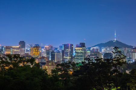 Cityscape of Seoul and skyscrapers in Dongdaemun area There is Namsan Mountain in the background, South Korea.の写真素材