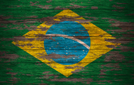 brazil flag painted on old wood backgroundの写真素材
